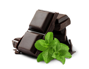 Dark chocolate pieces and mint leaves on white background