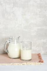 Glass of milk and jug
