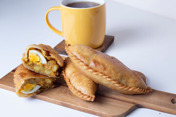 Malaysian pastry Karipap (Curry puff) with chicken, potatoes, hard boiled egg filling.