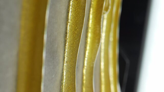 Freshly pressed medical cannabis, hash, live rosin, macro. Concentrate or cannabis oil obtained by heat-pressing fresh marijuana auto-flowering plants. Production of CBD isolate