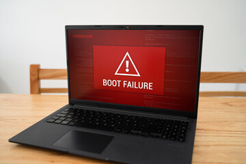 Laptop screen with boot failure notification. Problems loading operative system and booting error concept.