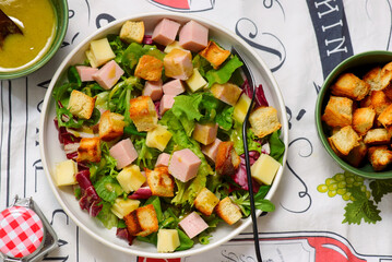 Parisian salad with cheese, ham and croutons