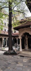 Picture of the inside of a very old and quiet monastery in the city center of Bucharest, Romania
