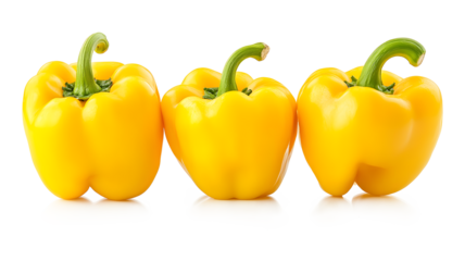 Three yellow peppers are lined up on a white background. The peppers are all the same size and shape, and they are all facing the same direction. The image has a simple feel to it