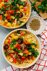 Traditional Uzbek dish lagman made from vegetables, meat and noodles .