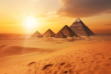 Ancient Egypt, pyramids rising from the golden sands under a setting sun 