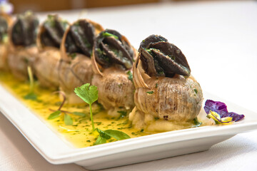 Burgundy snails, buttered snails with parsley, a traditional French gourmet dish, French food