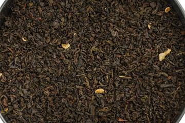 Black tea with bergamot macro photo. Black tea leaves.