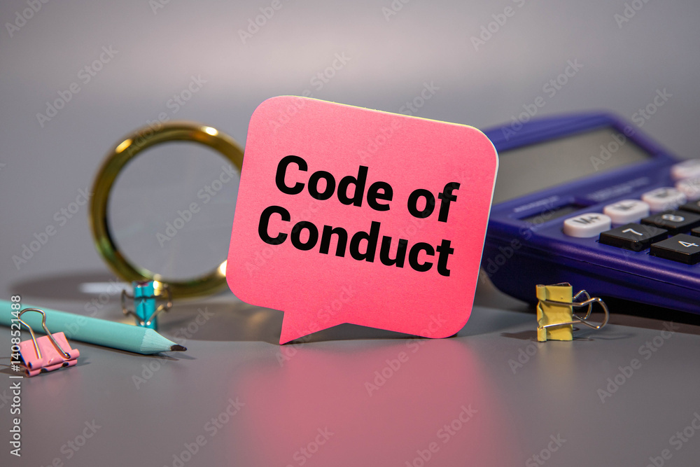 Poster code of conduct on notepad and various business papers on brown background.