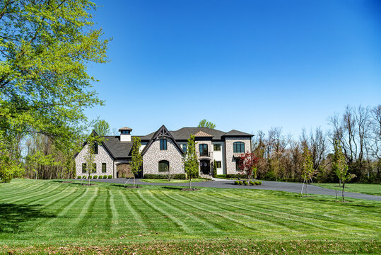 Big House suburb Single Family . Brick house with nice landscape and large green lawn.