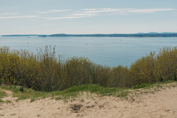 view of Puget Sound water from Discovery Park bluff in Seattle, Washington