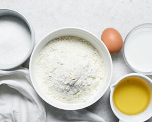 Overhead view of ingredients for making homemade cake, top view of mise en place of ingredients for making cake