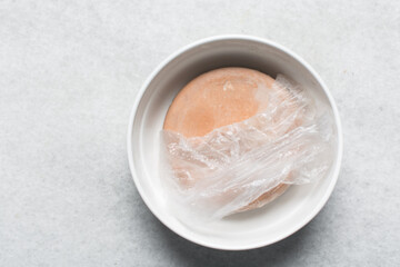 Overhead view of nigerian akamu or pap paste, process of making akamu, flatlay of process of making nigerian akamu ogi pap or guinea corn pudding