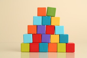 Family tree made with colorful cubes on beige background
