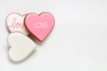 Heart shaped cookies on white textured background. Valentine's day celebration