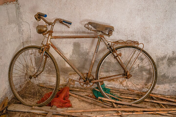 old bike in a state of degradation bringing back memories of the past