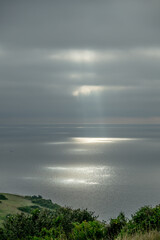 Rays of Sun Break Through Clouds to the Pacific