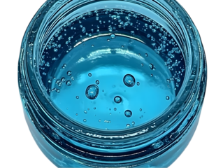 Abstract Image Of Bubbles Inside A Glass Jar With Turquoise Liquid