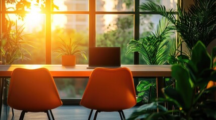 Fototapeta premium Modern Workspace with Sunlight and Lush Plants