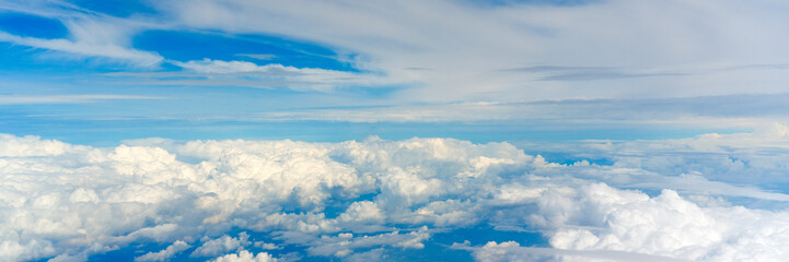 Aerial cloudscaspe panoramic view of the picturesque clouds and sky from a height in the day over the horizon