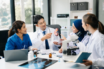 Fototapeta premium Medical, meeting and doctors with laptop for research, planning and hospital schedule management. Health, professional and people team for brainstorming in hospital