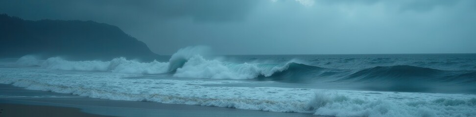 Naklejka premium Dark grey ocean, heavy fog, curling waves breaking , sand, mysterious