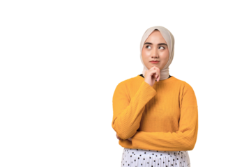 Beautiful pensive Asian girl wearing hijab looking aside at empty space, touching chin, thinking about offer isolated on transparent background