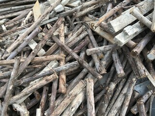 pile of wood logs for sale, background
