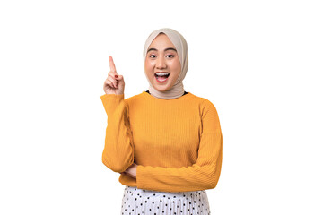 Excited beautiful Asian girl wearing hijab having creative idea, pointing finger up at copy space isolated on transparent background