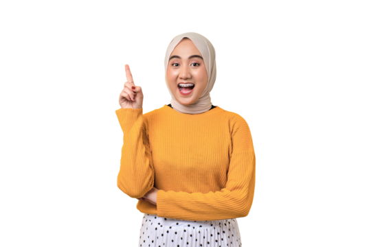 Excited beautiful Asian girl wearing hijab having creative idea, pointing finger up at copy space isolated on transparent background