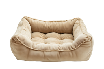A plush beige pet bed with a cushioned interior and raised sides on a black isolated background space