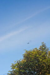 Clear Blue Sky Background With Scattered Clouds