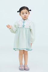 Cute Chinese little girl on white background
