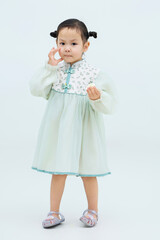 Cute Chinese little girl on white background