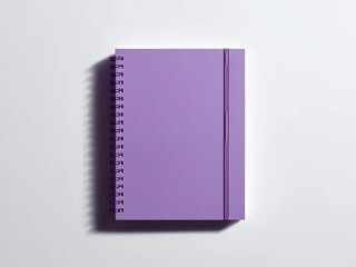 Blank purple spiral notebook mockup on white background.