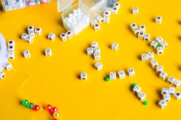 Set of three beaded children bracelets on a white background closeup