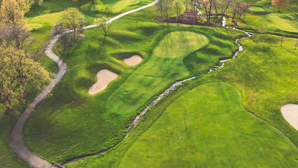 a golf course hole from an aerial point of view background landscape