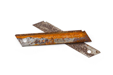 Old used cutter blades that are full of rust isolated on white background.