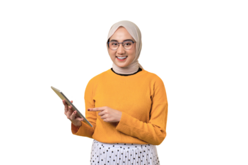 Beautiful happy Asian girl wearing hijab using digital tablet and smiling at camera isolated on transparent background