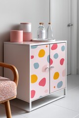 Close-up of cheerful, colorful artwork on a cabinet in a gynecologist's office - clinic doctor cheerful modern design