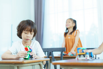 Group of diverse children enjoy learning about the STEM.
