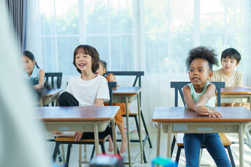 Group of diverse children enjoy learning about the STEM.
