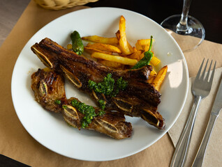 Traditional Spanish dish is Churasco, made from roast beef. Served with French fries and stewed peppers