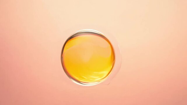 The camera pans left to show a yellow bubble drifting horizontally against a pink background, with side lighting