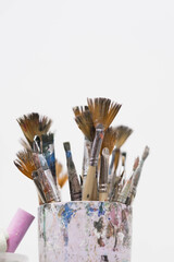 Brushes and spatulas on a white background. The tools of an artist or a sculptor for drawing. Creative professions, master classes. High quality photo