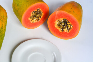 Papaya fruit (Carica papaya) in isolated white background, (papaya on white background)