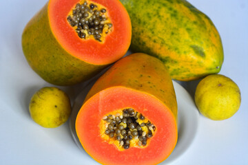Papaya fruit (Carica papaya) in isolated white background, (papaya on white background)