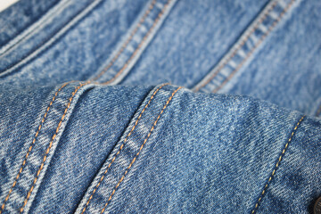 seam of blue denim texture background, jean fashion style
