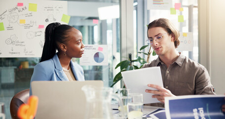 Laptop, marketing strategy and meeting with business people in office for discussion or planning. Collaboration, documents and global reach with employee team in creative workplace for workflow
