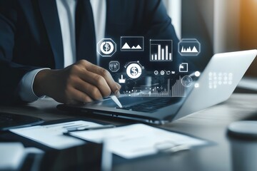 Businessperson analyzing financial data on laptop